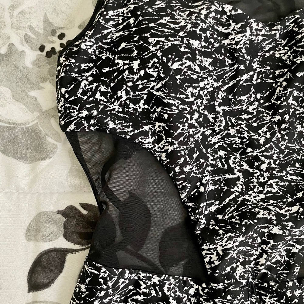 Rare LIKE NEW Lululemon cutout one piece swim suit with tie detail in back. - Picture 3 of 5